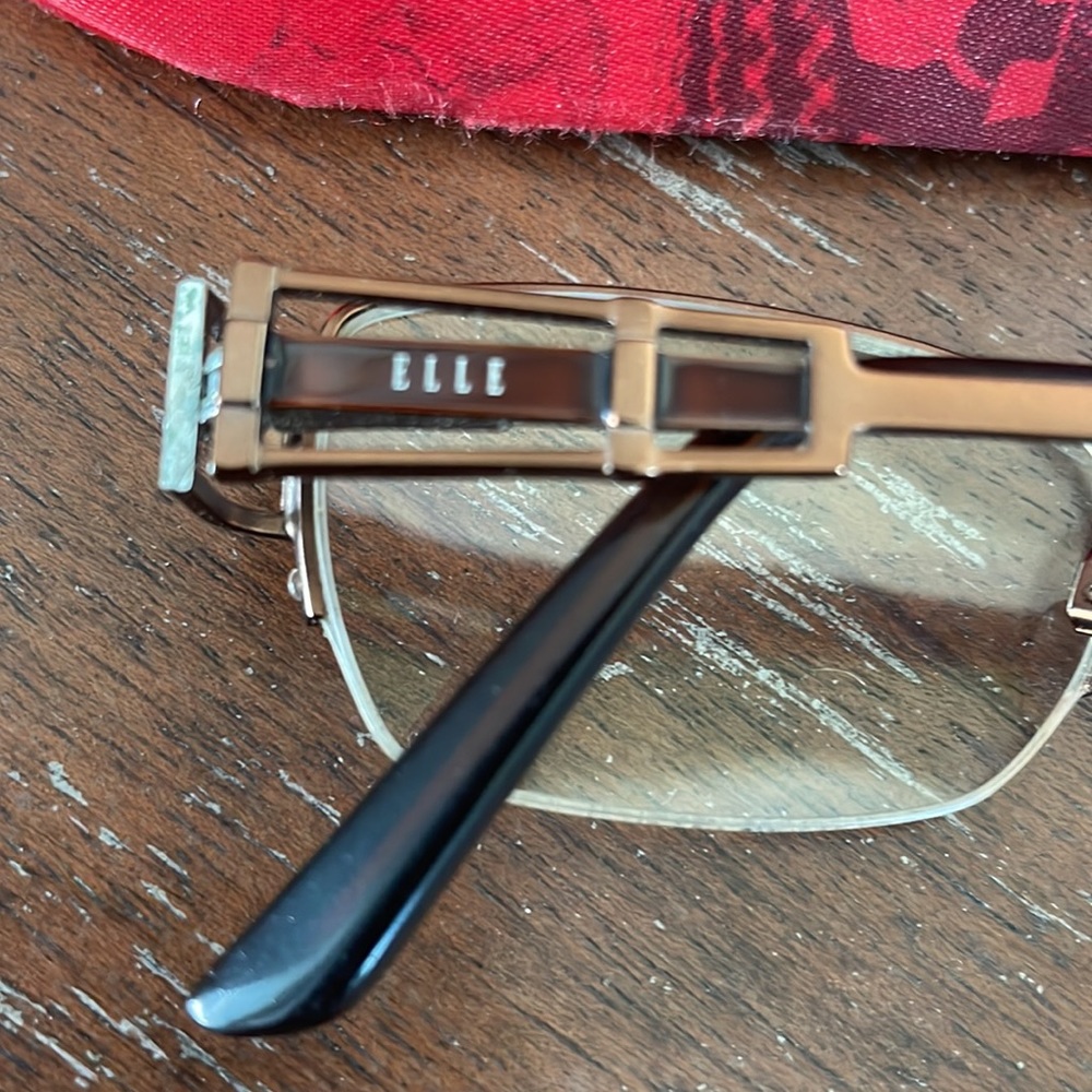 Elle El18779 Brown And Bronze Wire Half Rim Eyeglasses With Red Design Elle Case View 4
